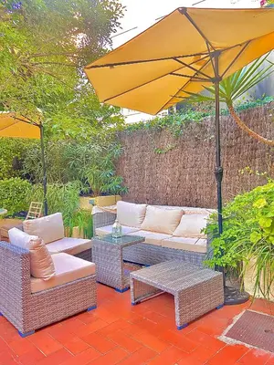 Coin salon dans l'établissement Hôtel Jardin Croisette