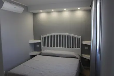 Un ou plusieurs lits dans un hébergement de l'établissement B&B Bessy 10