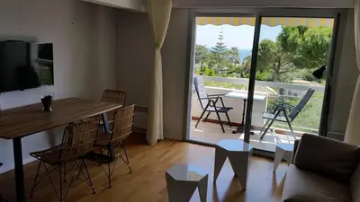 Télévision ou salle de divertissement dans l'établissement Green Cap d'Antibes