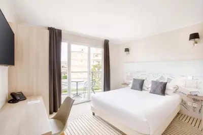 Un ou plusieurs lits dans un hébergement de l'établissement Best Western Plus Antibes Riviera