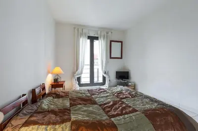 Un ou plusieurs lits dans un hébergement de l'établissement Appartement de charme à Cannes + terrasse