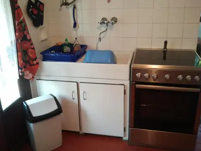 Cuisine ou kitchenette dans l'établissement Villa Mané