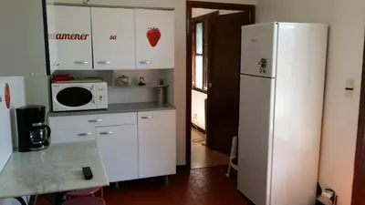 Cuisine ou kitchenette dans l'établissement Villa Mané