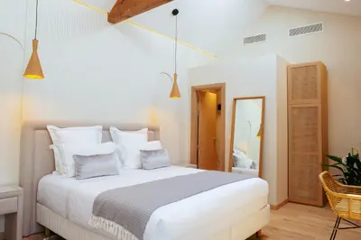Un ou plusieurs lits dans un hébergement de l'établissement Boutique Hôtel Villa Fabulite