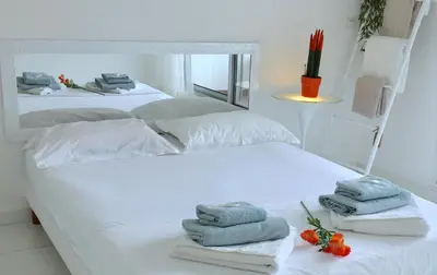 Un ou plusieurs lits dans un hébergement de l'établissement Appartements Cannes