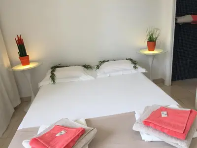 Un ou plusieurs lits dans un hébergement de l'établissement Appartements Cannes