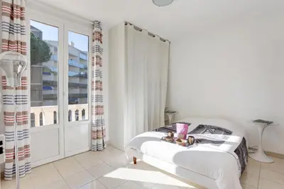 Un ou plusieurs lits dans un hébergement de l'établissement Appartements Cannes