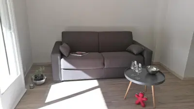 Coin salon dans l'établissement Yvisa