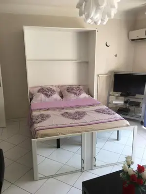 Un ou plusieurs lits dans un hébergement de l'établissement Studio Cannes la Croisette
