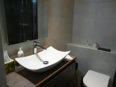 Salle de bains dans l'établissement Juan Plage