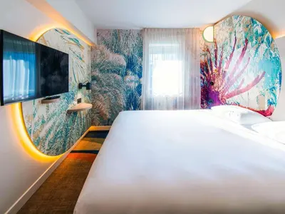 Un ou plusieurs lits dans un hébergement de l'établissement ibis Styles Antibes