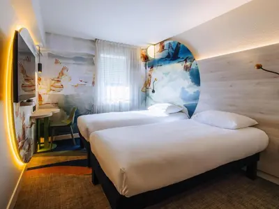 Un ou plusieurs lits dans un hébergement de l'établissement ibis Styles Antibes