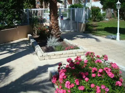 Jardin de l'établissement App T2 cozy Proche de la Mer