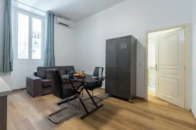 Coin salon dans l'établissement Florella Marceau Apartment