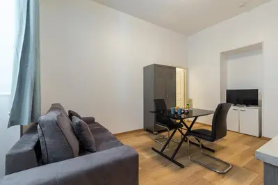 Télévision ou salle de divertissement dans l'établissement Florella Marceau Apartment