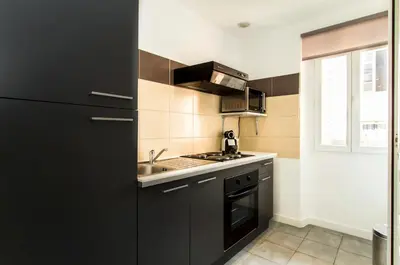 Cuisine ou kitchenette dans l'établissement Florella Achard Apartment