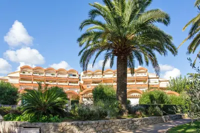 Jardin de l'établissement Appartement charmant à Antibes, 33 m², piscine partagée