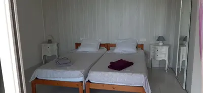 Un ou plusieurs lits dans un hébergement de l'établissement Maison Margot