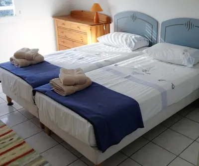 Un ou plusieurs lits dans un hébergement de l'établissement Residence de la Mer