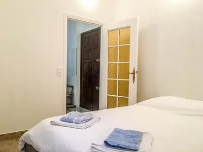 Un ou plusieurs lits dans un hébergement de l'établissement Cannes - Beachfront with private garden - Palm Beach Croisette