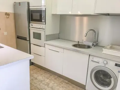 Cuisine ou kitchenette dans l'établissement Cannes - Beachfront with private garden - Palm Beach Croisette