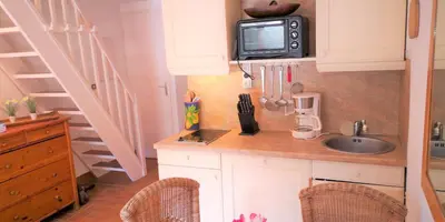 Cuisine ou kitchenette dans l'établissement Résidence Cap Azur Maison N° 26