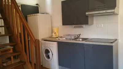 Cuisine ou kitchenette dans l'établissement Résidence Cap Azur Maison N° 56