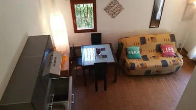 Télévision ou salle de divertissement dans l'établissement Résidence Cap Azur Maison N° 56
