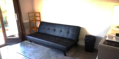 Coin salon dans l'établissement Résidence Cap Azur Appartement 108