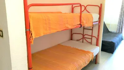 Un ou plusieurs lits dans un hébergement de l'établissement Résidence Cap Azur Appartement 229