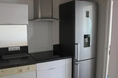 Cuisine ou kitchenette dans l'établissement le chantilly