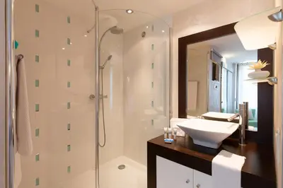 Salle de bains dans l'établissement Aby