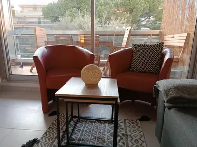 Coin salon dans l'établissement Le Corinthe studio apartment