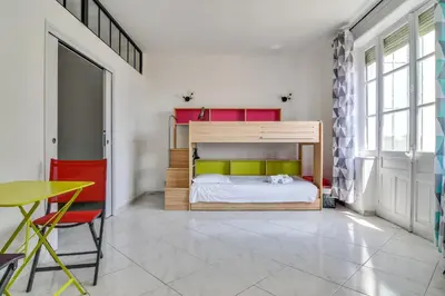 Un ou plusieurs lits dans un hébergement de l'établissement IMMOGROOM - Sea View - Balcony - 5 min from the beach - AC - Wifi