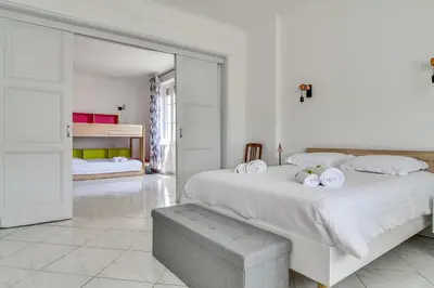 Un ou plusieurs lits dans un hébergement de l'établissement IMMOGROOM - Sea View - Balcony - 5 min from the beach - AC - Wifi
