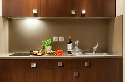 Cuisine ou kitchenette dans l'établissement Nehô Suites Cannes Croisette