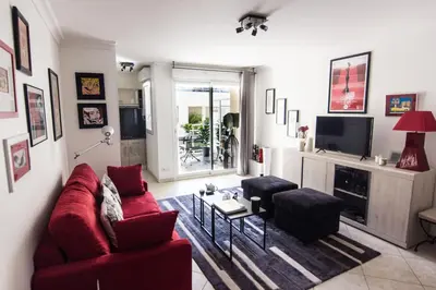 Télévision ou salle de divertissement dans l'établissement Le Parc Pointe Croisette