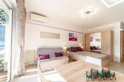 Un ou plusieurs lits dans un hébergement de l'établissement L'Ascot Appartement, plages à 300m, vue hippodrome