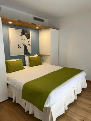 Un ou plusieurs lits dans un hébergement de l'établissement Arthur Properties Rue d'Antibes