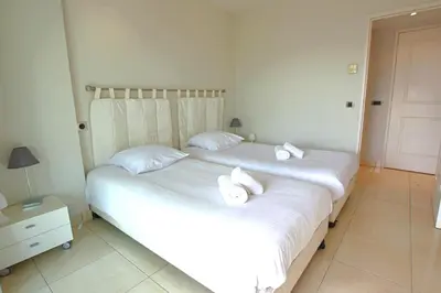 Un ou plusieurs lits dans un hébergement de l'établissement Appartement entièrement équipé avec grande terrasse salon d' extérieur