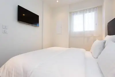 Un ou plusieurs lits dans un hébergement de l'établissement MARTINEZ AREA: NEW 2BEDS/2BATHS