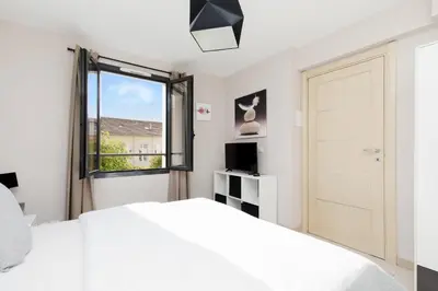 Un ou plusieurs lits dans un hébergement de l'établissement 3 bedrooms: 200m from Croisette