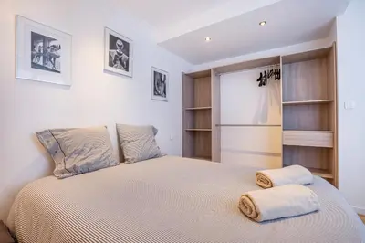 Un ou plusieurs lits dans un hébergement de l'établissement 3 pièces Luxe Croisette