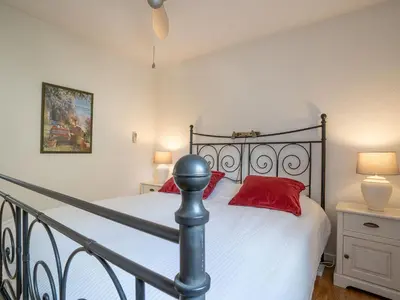 Un ou plusieurs lits dans un hébergement de l'établissement Apartment Le Mandarin by Interhome