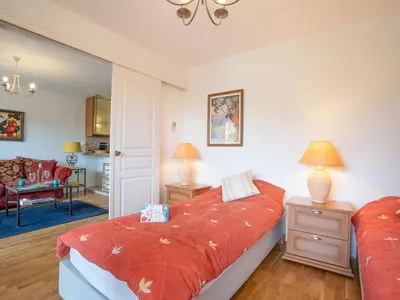 Un ou plusieurs lits dans un hébergement de l'établissement Apartment Le Mandarin by Interhome