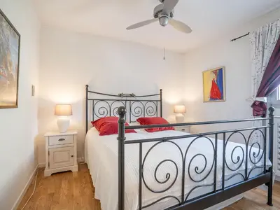 Un ou plusieurs lits dans un hébergement de l'établissement Apartment Le Mandarin by Interhome