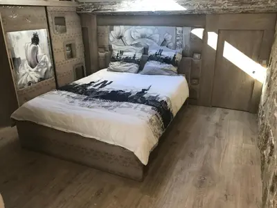 Un ou plusieurs lits dans un hébergement de l'établissement Love Room Jacuzzi Croisette