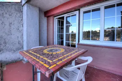 Balcon ou terrasse dans l'établissement Hôtel Les Arcades