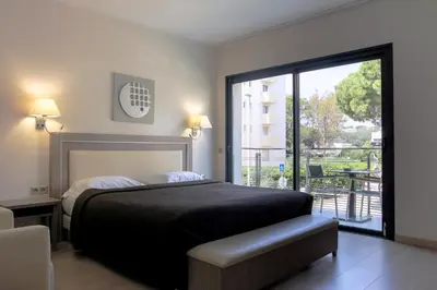 Un ou plusieurs lits dans un hébergement de l'établissement Villa Azur