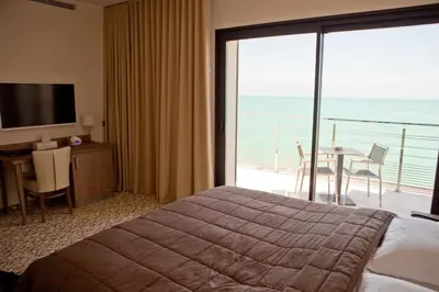 Un ou plusieurs lits dans un hébergement de l'établissement Villa Azur